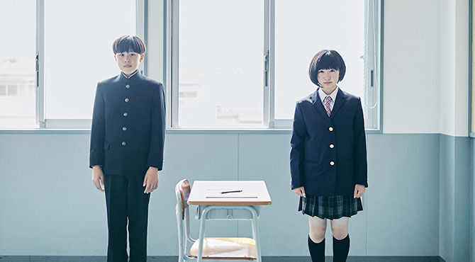 School girl and boy in uniform in Japan