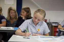 A girl studies at Kent College Pembury