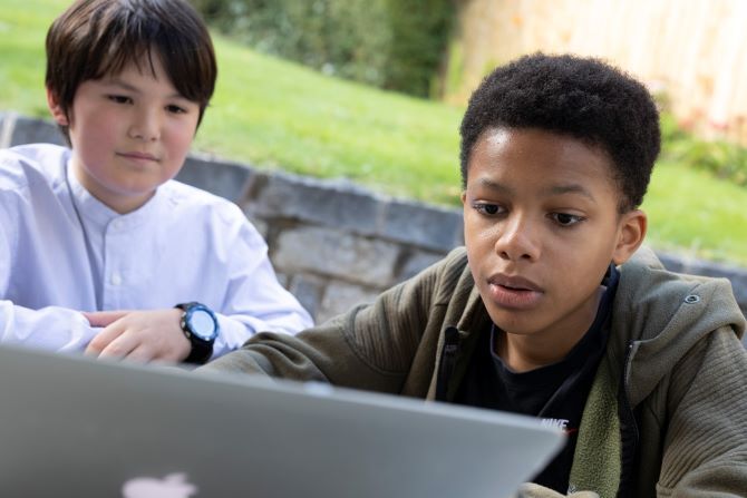 Image of young children studying at King's InterHigh