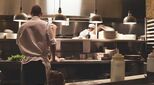 Chefs working in kitchen