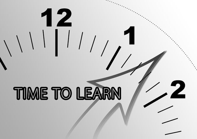 Image of clock with time to learn superimposed