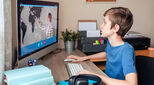 Image of child remote learning at desk