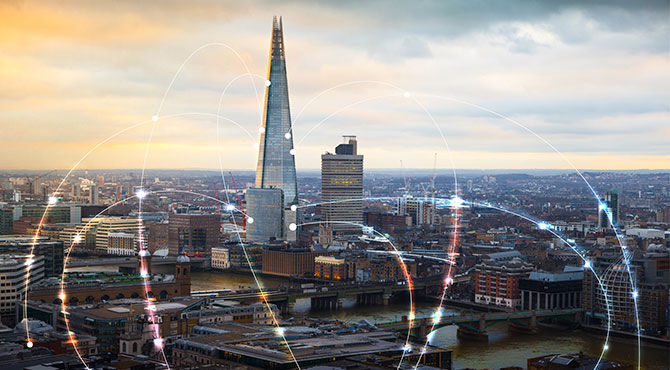 London skyline, including the Shard, illustrates an article about technology