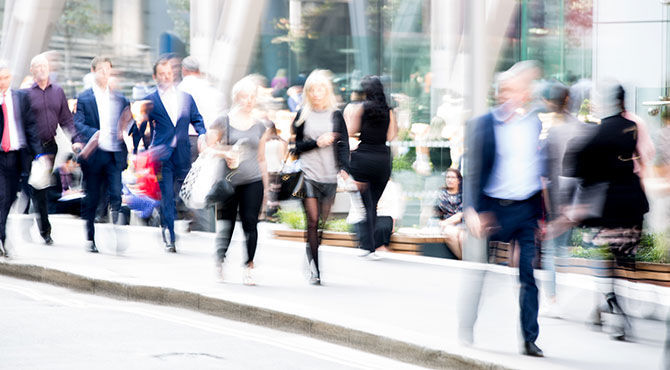 Panorama of workers walking in London