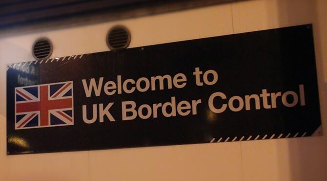 Border control image illustrates article in which British industry responds to the latest MAC immigration report
