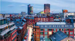 Manchester City centre light trails before sunrise