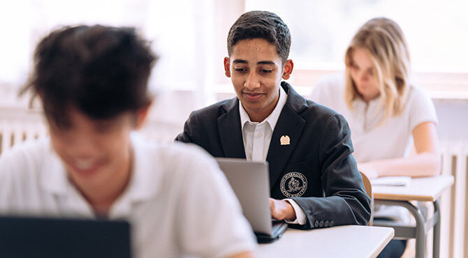 Marymount School Rome students on their laptops