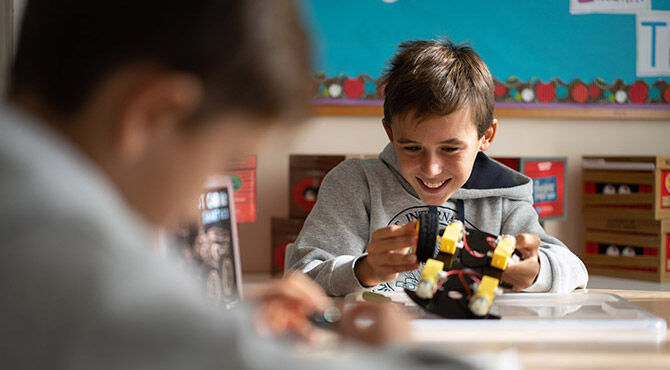 Marymount School Rome young boy in a science class