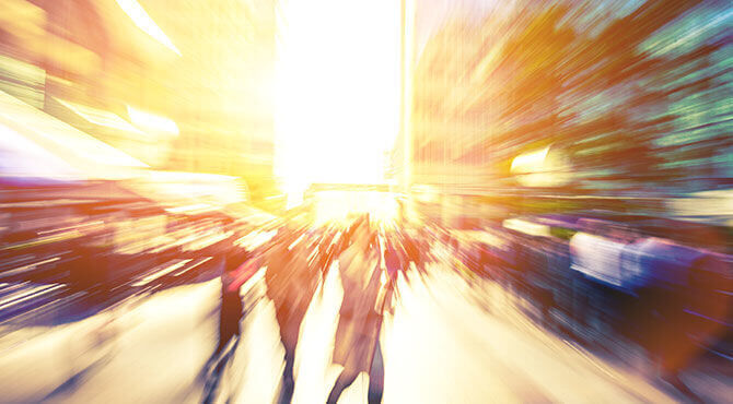 Ensuring a globally mobile workforce - image of a busy city street in bright sunlight