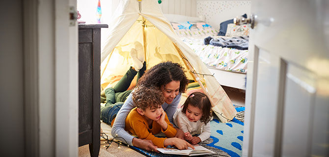 Mum and kids with indoor tent