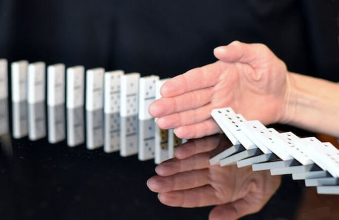 Hand and domino rally