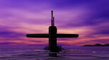 A nuclear submarine on the surface at dusk