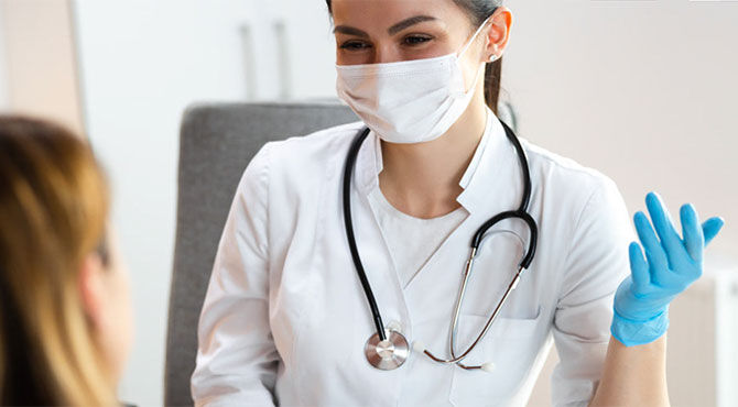 Female doctor with patient