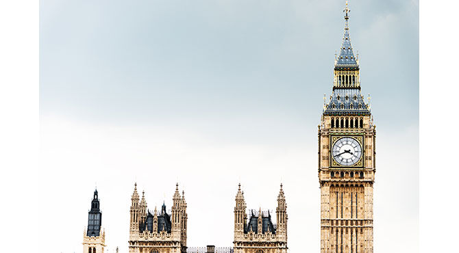 The rooftops of the iconic neo-Gothic Houses of Parliament buildings in London England