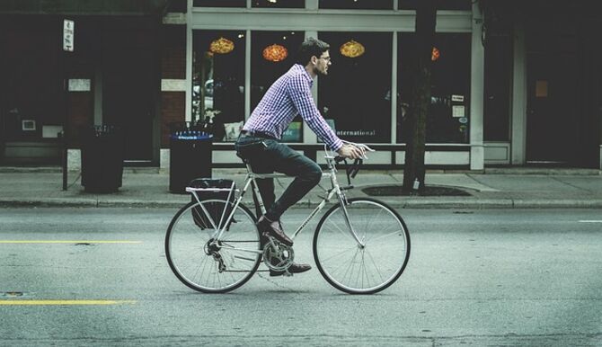 Man on a bike in city