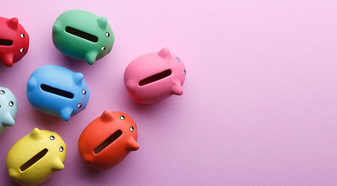 Piggy banks illustrating an article about financial impacts on wellbeing
