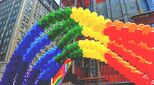 NY Pride balloons outside office buildings