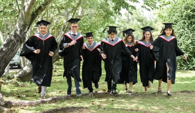 Image of Regents International School students celebrating graduation
