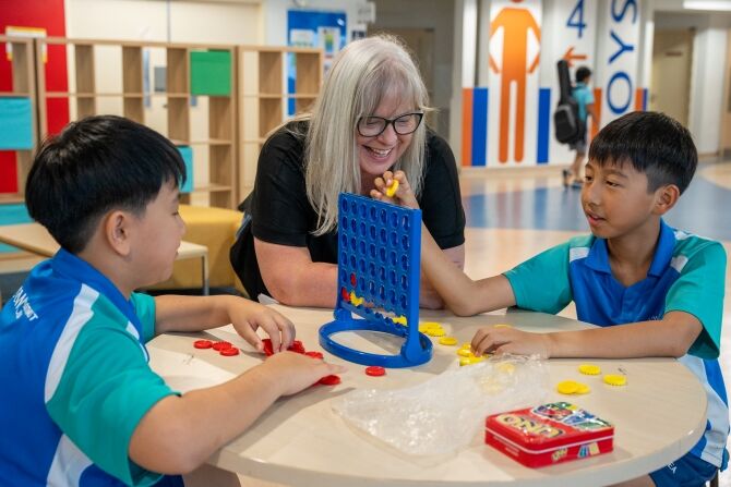 Pauline-Markey-UWCSEA-with-students