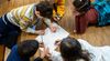 CIS-children-writing-on-shared-paper