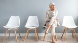 woman-on-chair-stock-image