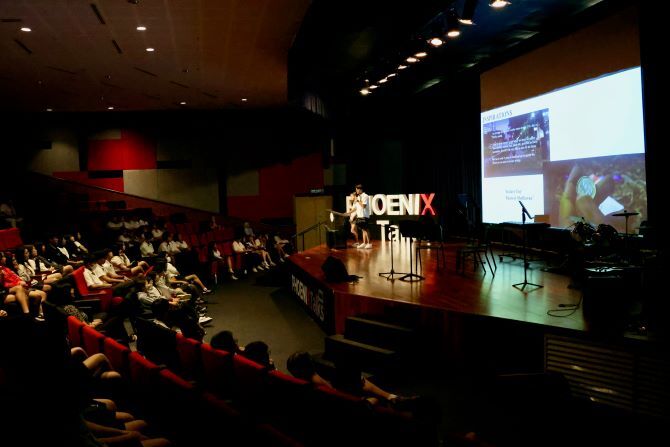 Image of students on stage at IGBIS