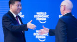 President Xi Jinping shakes Professor Klaus Schwab's hand at WEF 2017 Davos opening
