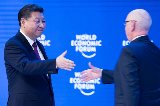 President Xi Jinping shakes Professor Klaus Schwab's hand at WEF 2017 Davos opening