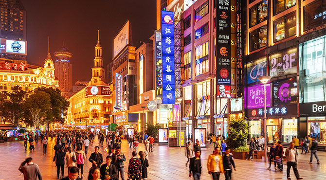 Chinese shoppers in the street in Shanghai