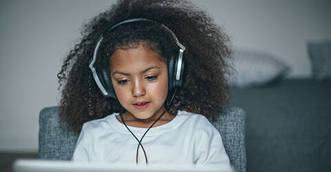 Young girl with headphones