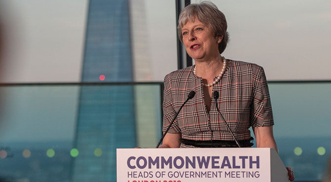 Theresa May speaking at CHOGM