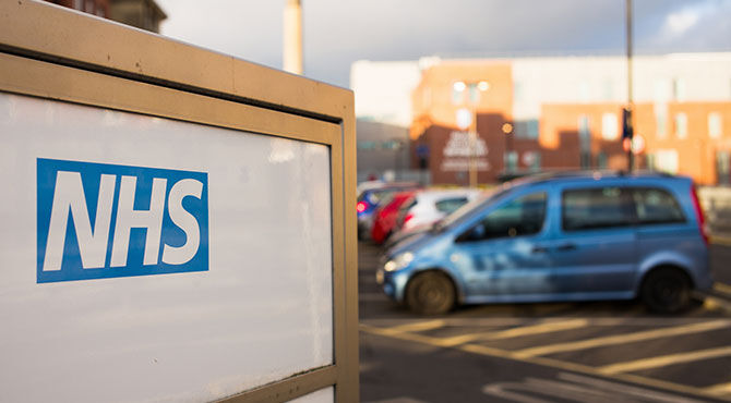 NHS sign and buildings