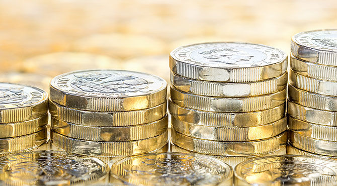 Stack of increasing UK pound coins