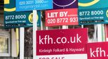 UK house prices growth continues to stutter - for sale signs
