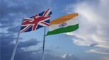 Uk and India national flags flying alongside each other