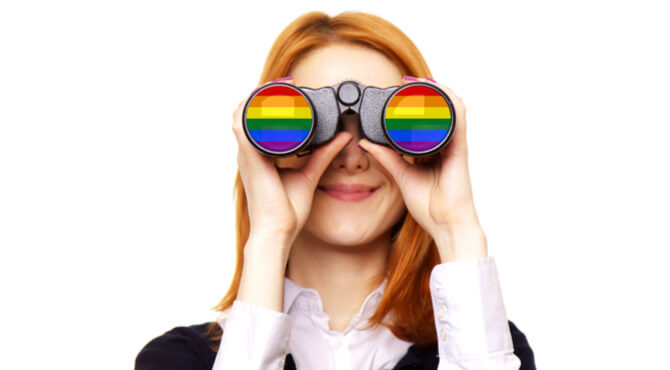 Image of woman looking through rainbow lens binoculars