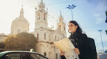 Image of woman with a map in Portugal