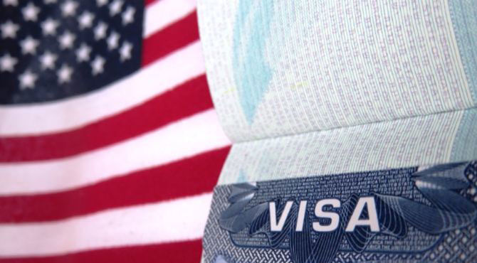 US flag with passport and word visa