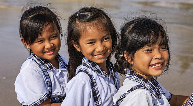 Vietnamese schoolgirls on a beach in Vietnam