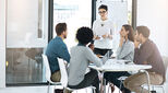 Cropped shot of a businesswoman giving a presentation to her colleagues in a modern office