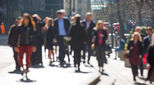 Workers walking on a city street in the UK