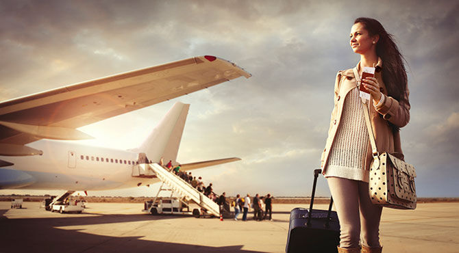 Young traveller getting off of a flight